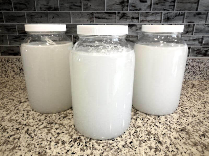 filled diy natural laundry detergent bottles